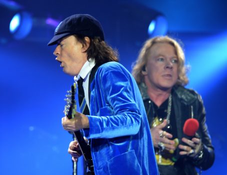 Australian rock band AC/DC's guitarist Angus Young (L) and US singer Axl Rose (R) perform on stage in Marseille, southern France, on May 13, 2016. / AFP / BORIS HORVAT (Photo credit should read BORIS HORVAT/AFP/Getty Images)