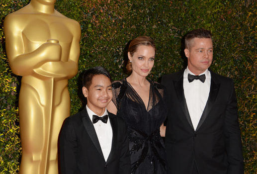 Angelina Jolie, Maddox Jolie-Pitt und Brad Pitt 2013 in Hollywood