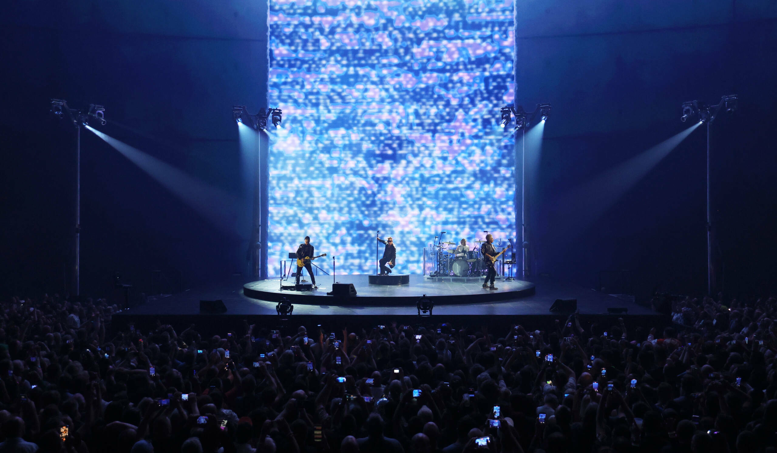 LAS VEGAS, NEVADA - SEPTEMBER 29: (Exclusive Coverage) Bono, The Edge, Adam Clayton and Bram van den Berg of U2 perform during opening night of U2:UV Achtung Baby Live at Sphere on September 29, 2023 in Las Vegas, Nevada. (Photo by Kevin Mazur/Getty Images for Live Nation)